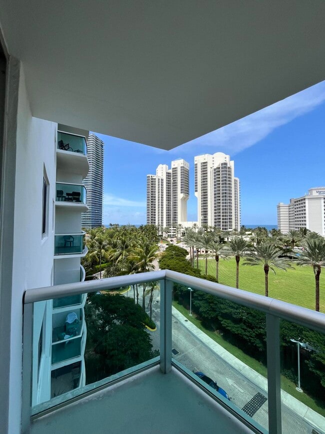 Building Photo - 19370 Collins Ave