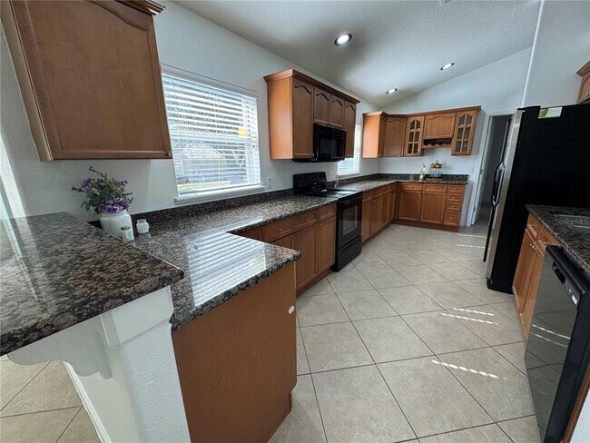 Building Photo - 14940 Day Lily Ct