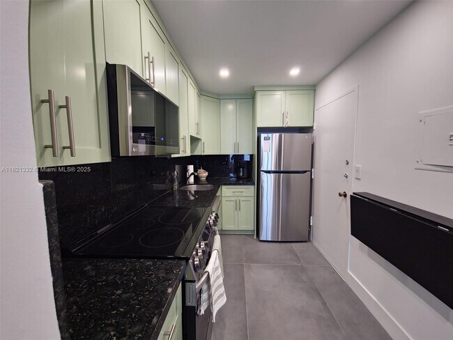 Building Photo - 5555 Collins Ave
