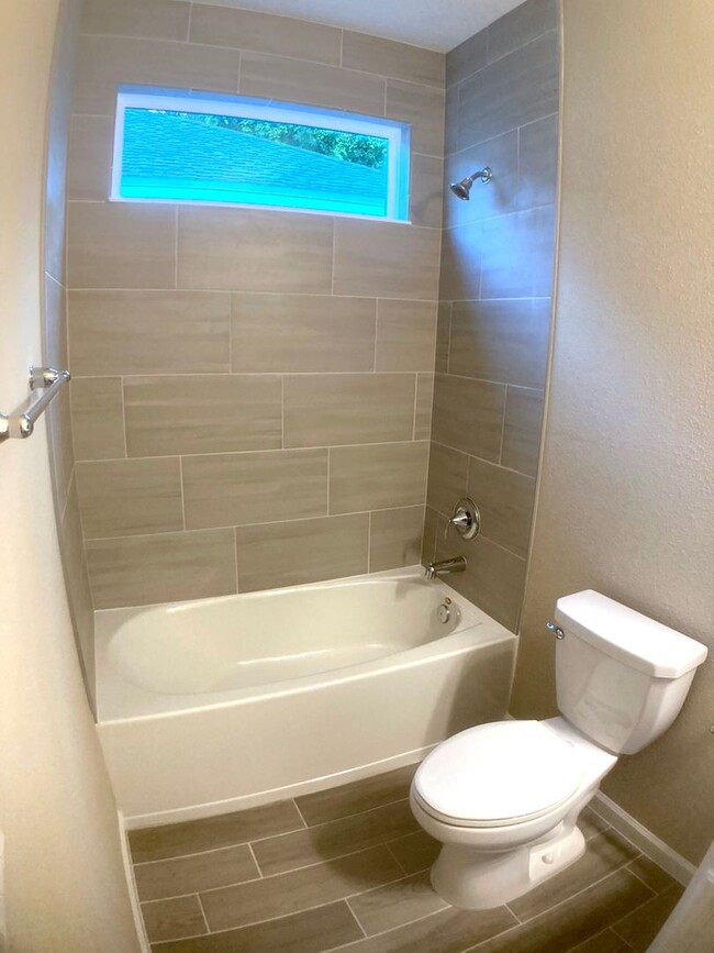 Building Photo - Your Private Escape with High-End Finishes...