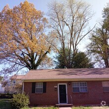 Building Photo - Lovely Two Bedroom One Bathroom Brick Duplex