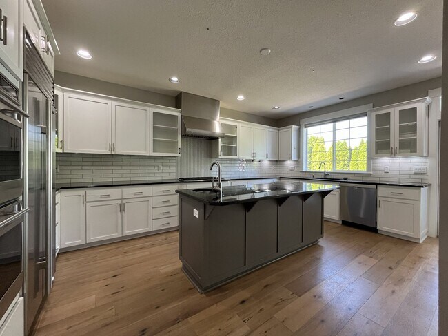 Building Photo - Beautifully Updated 3-Bedroom Bethany Home with Chef's Kitchen, Huge Bonus Room and Private Backyard