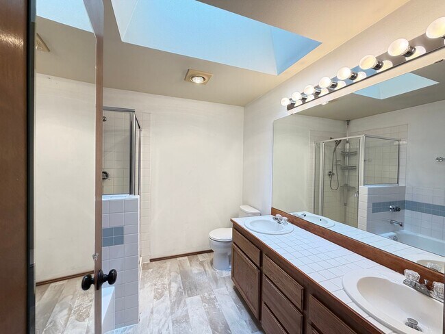 Building Photo - Saratoga Reach Beauty: Updated 4BR Home with Deck, Fireplace & Prime Mukilteo Location