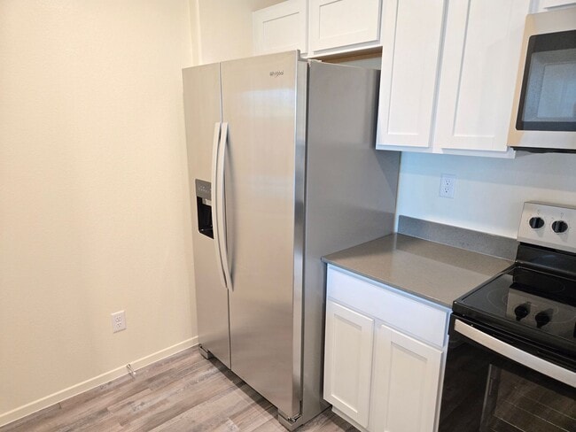 Building Photo - Kalea Trails Gated Cosmos Garden