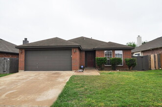 Building Photo - "Warm And Welcoming 3-2-2 With Open Living In a Prime Location!"