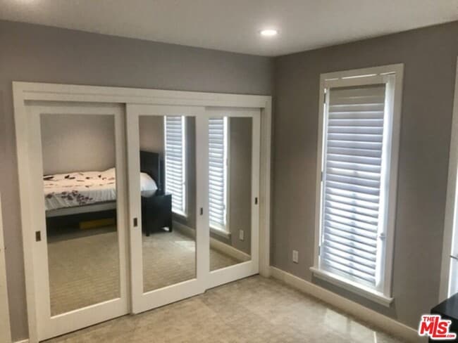 Building Photo - 248 S La Peer Dr