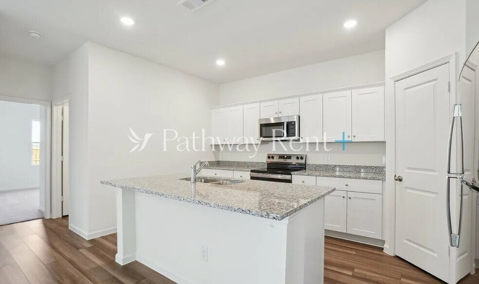 Building Photo - 209 Wild Daisy Wy