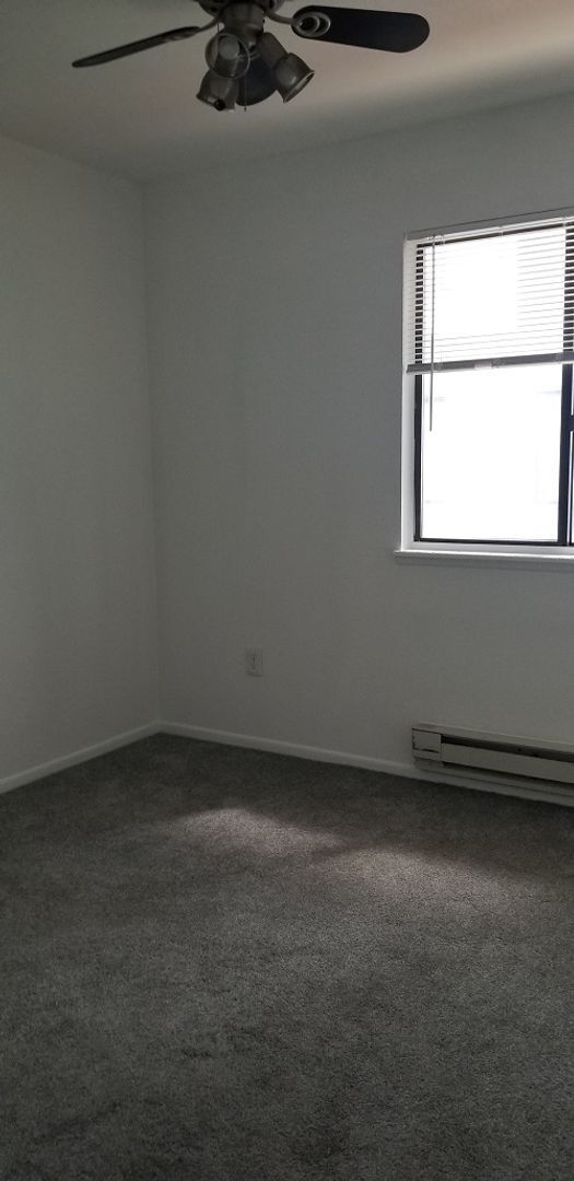 Building Photo - Bright 2-Bedroom Condo Ready for Move-In