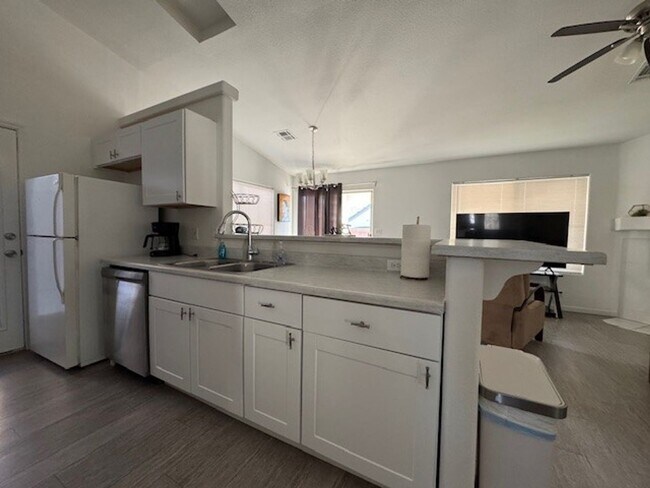 Building Photo - Pool Home with 3Bedrooms +Bonus Room Bullhead Parkway-Desert Foothills Estates- Can Be "Furnished...