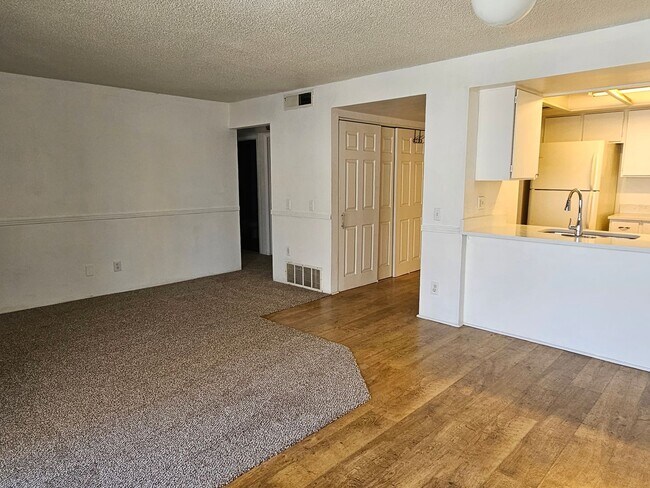 Building Photo - Roomy 1 Bedroom Condo on 2nd Floor with Covered Balcony