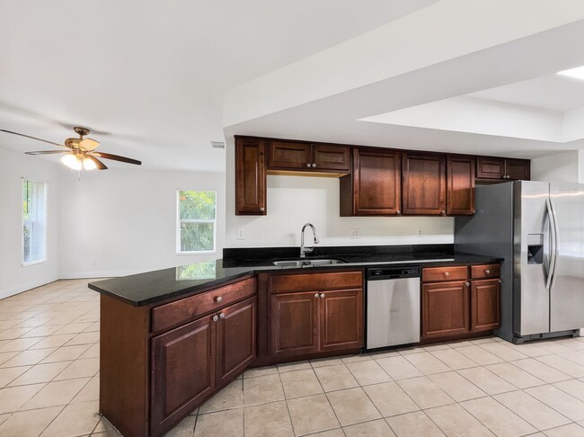 Building Photo - Annual rental offering privacy and space on 1.14 acres in Naples!