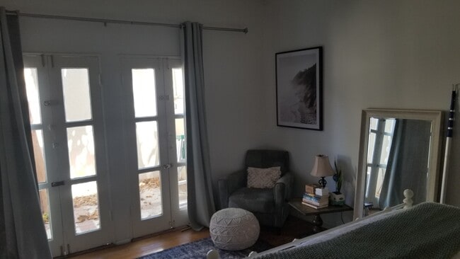 Bedroom looking out French doors - 9979 Robbins Dr