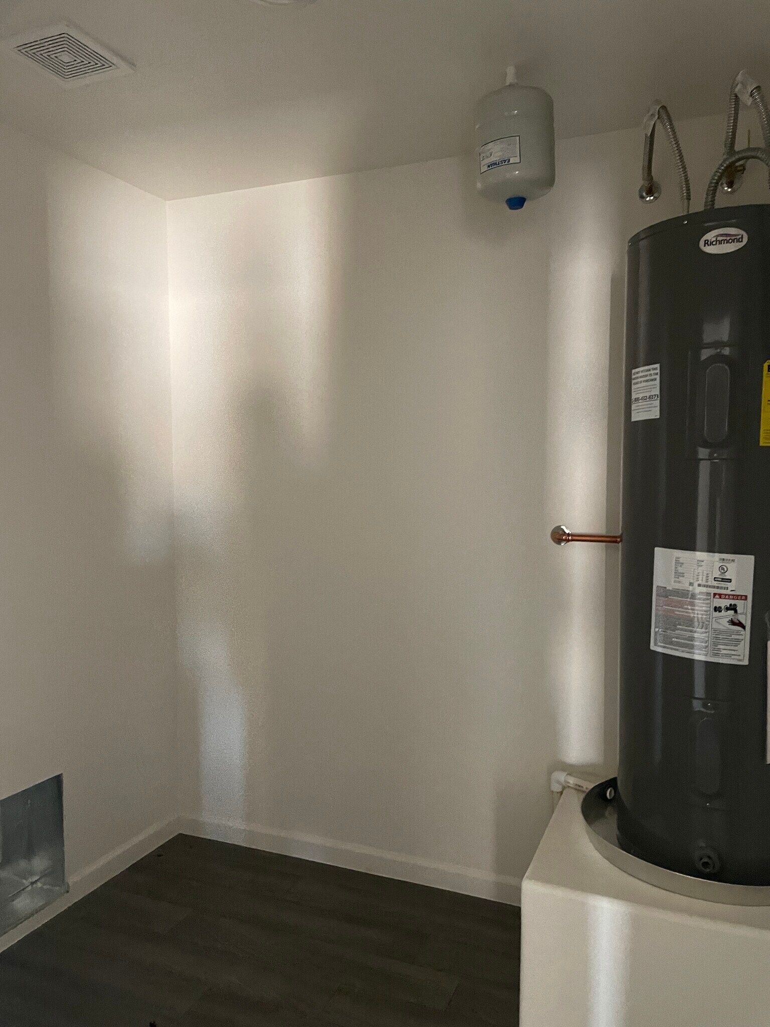 Separate laundry room (with water heater). Washer/dryer not pictured. 2 years old. - 6509 S Prado Cir