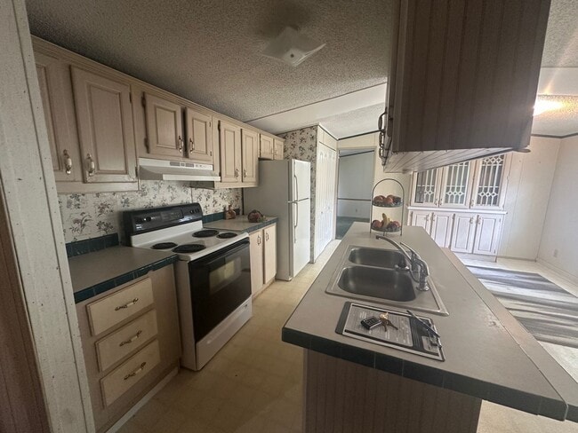 Building Photo - 3-bedroom, 2-bathroom Mobile Home Now Avai...