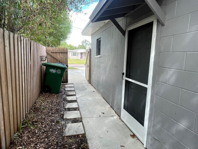 side door - 6604 S Mascotte St