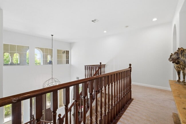 Building Photo - Private Gated Christopher Homes Estate in The Vineyards | Resort-Style Backyard & Strip Views