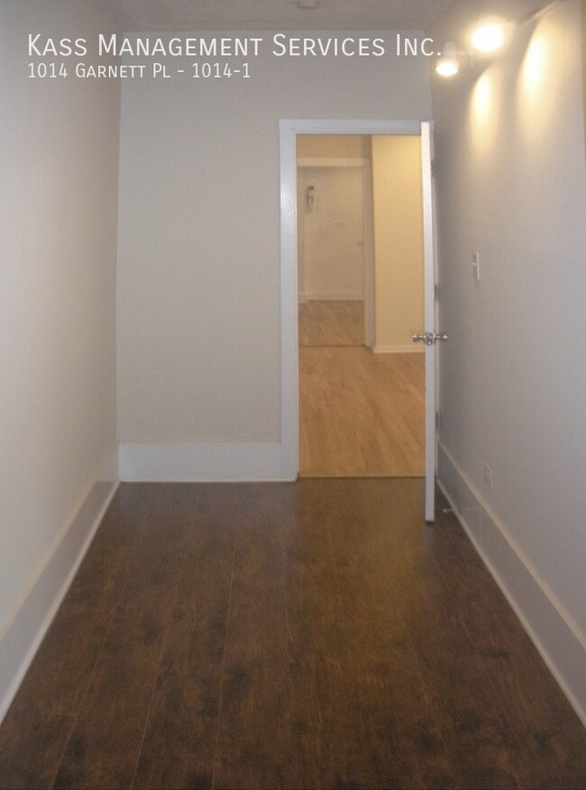 Building Photo - Very Spacious Duplex Apartment features 4 ...