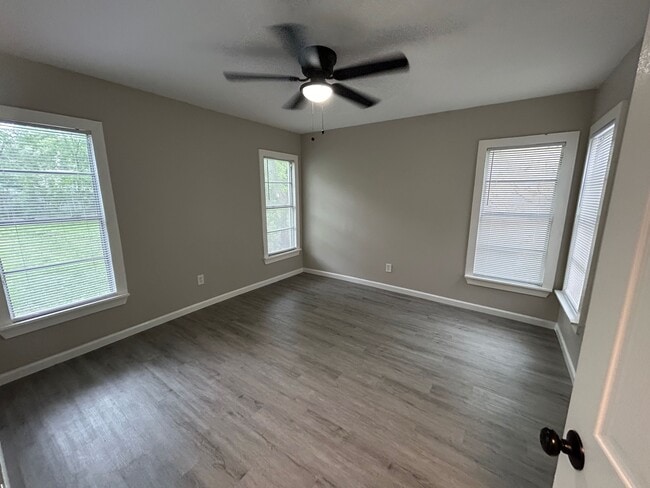 2nd Bedroom is spacious and full of light. - 2245 E Overton Rd