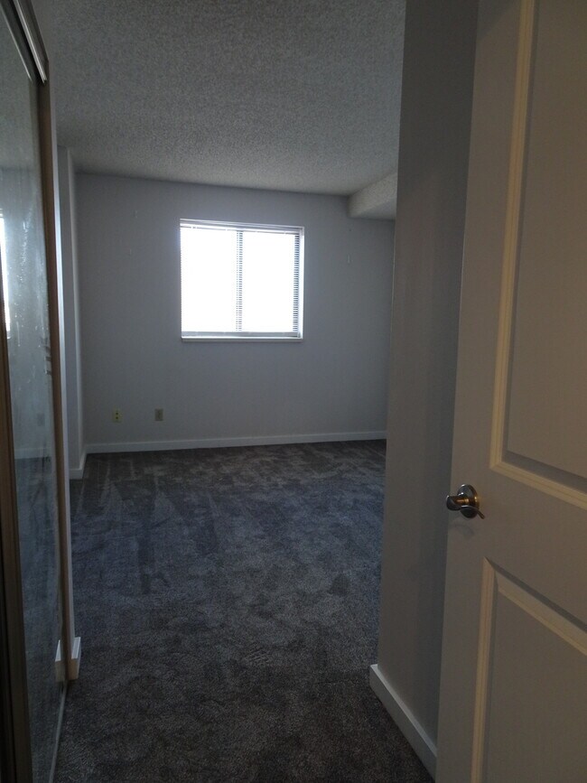 Bedroom with new flooring - 78 10th St E