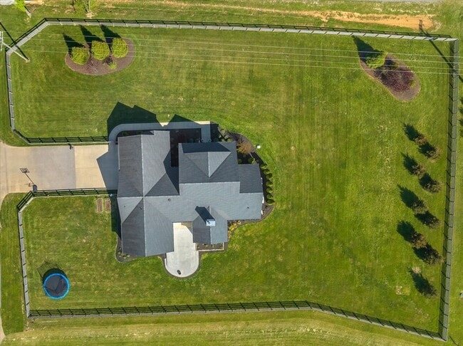 Building Photo - unning custom-built home on a full acre in...