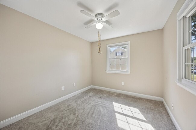 Building Photo - Available Immediately – 4 Bedroom End-Unit...