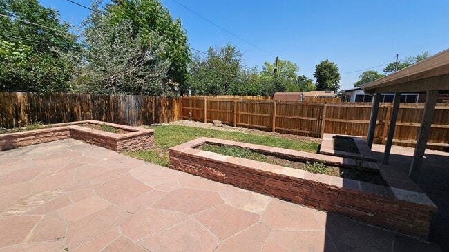 Building Photo - Spacious 5-Bedroom Ranch with Finished Basement & Oversized Garage!
