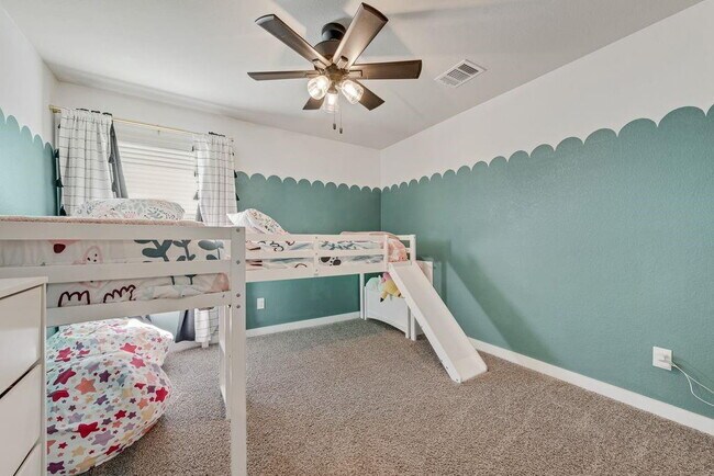 Building Photo - "Energy-Efficient 4-2 Home with Designer Finishes and a Spacious Backyard Retreat!"