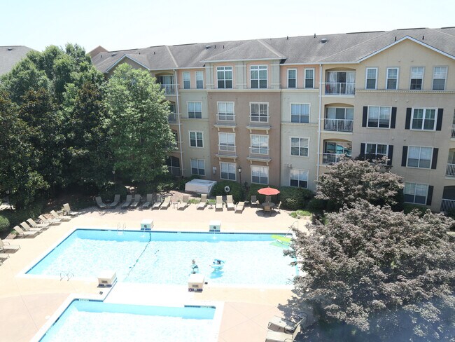 View of pool on property from living room - 10 Perimeter Summit Blvd NE