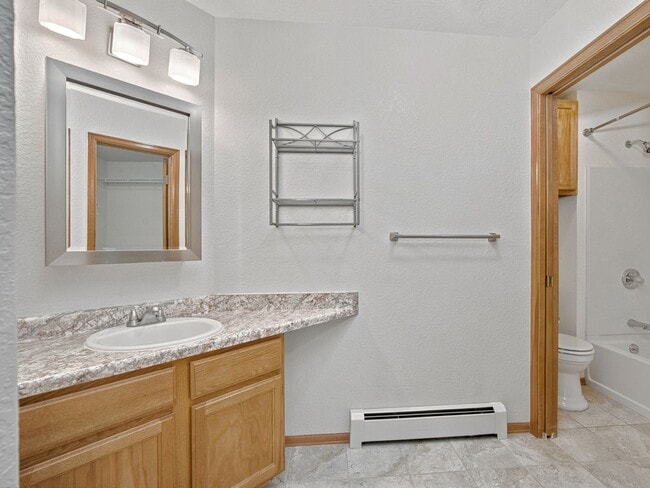 Building Photo - Spacious 2BR Rental with Open Floor Plan & Low-Maintenance yard
