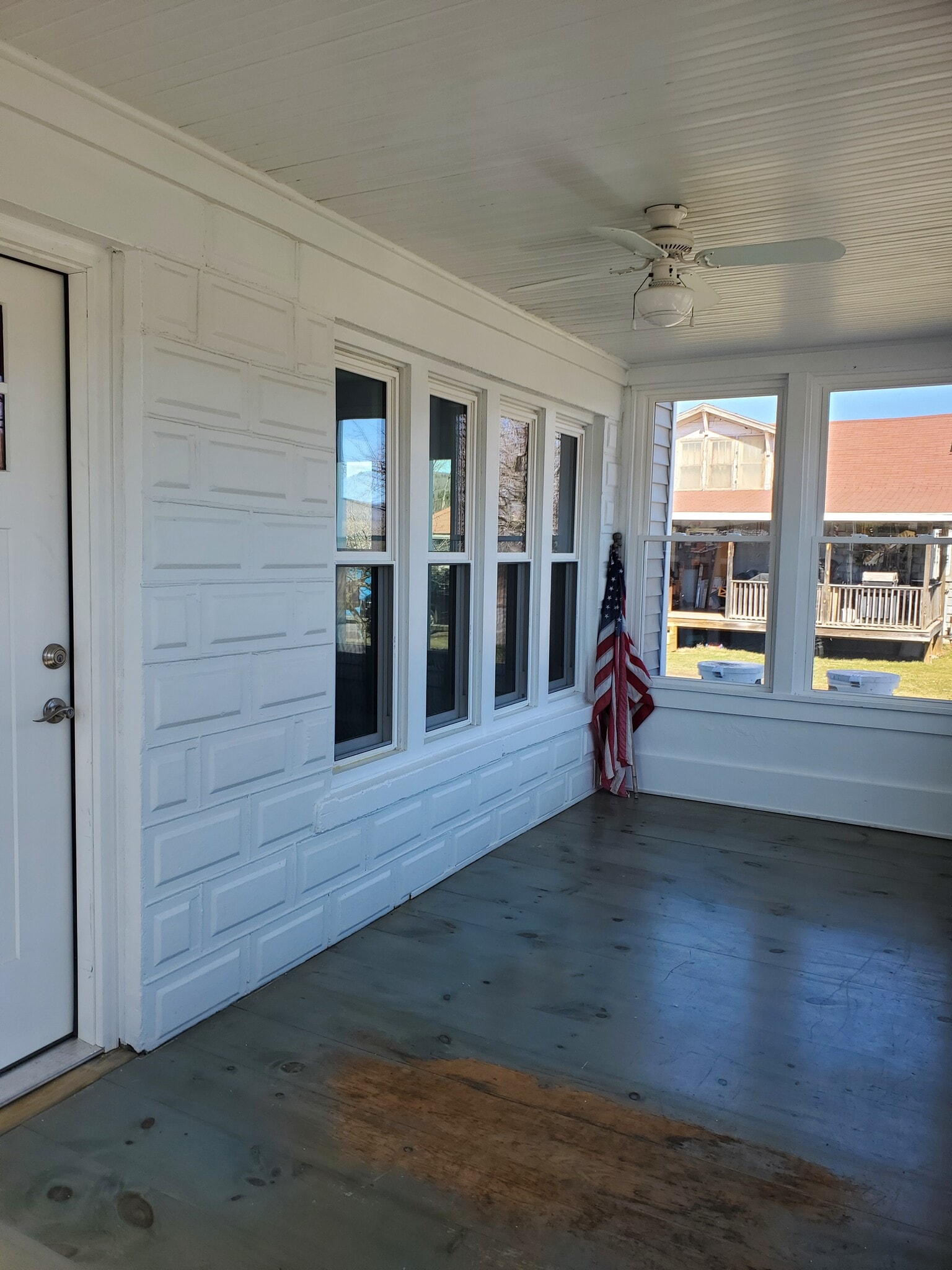 Enclosed front porch - 213 Main St