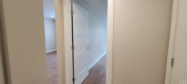 Building Photo - Large 2bd/2bath with Garage parking! Steps to Commuter Rail!