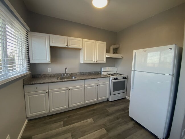 Interior Photo - 2044 International Blvd - Sunny Studios an...