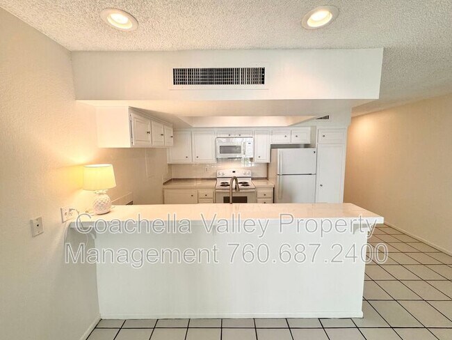 Building Photo - 1655 E Palm Canyon Dr