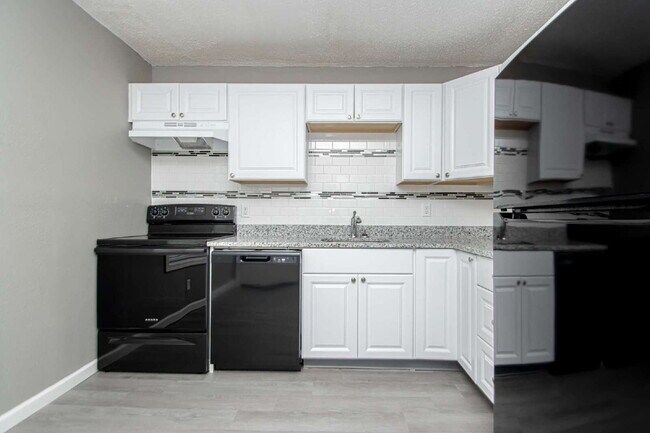 Building Photo - For Rent: Spacious Studio with 2 Baths in ...