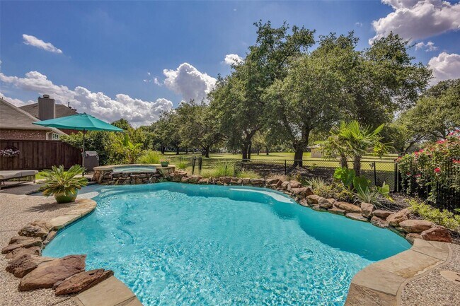 Building Photo - Located in a highly desirable neighborhood.