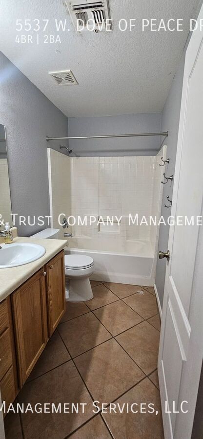 Building Photo - 5537 W Dove of Peace Dr