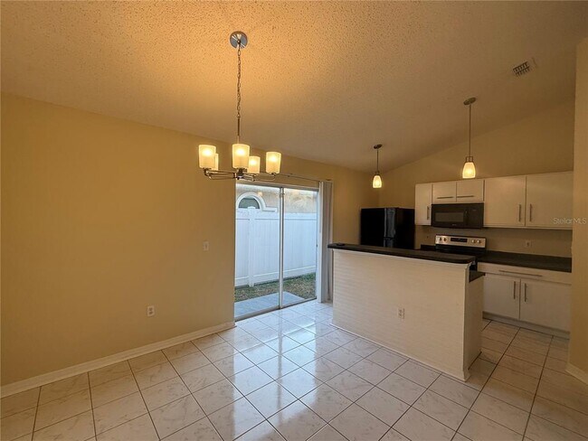 Building Photo - 6217 Calamari Pl