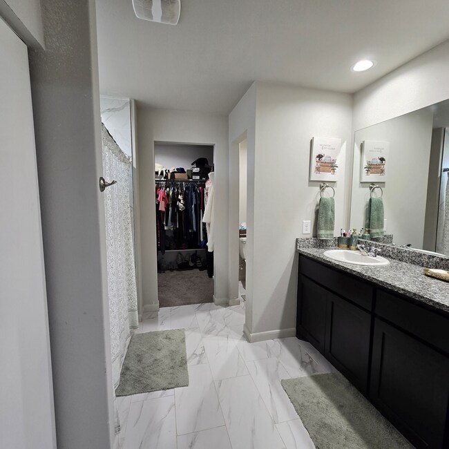 Building Photo - 7003 Adenium Rd