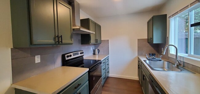 Kitchen with concrete counter tops - 446 SW I St