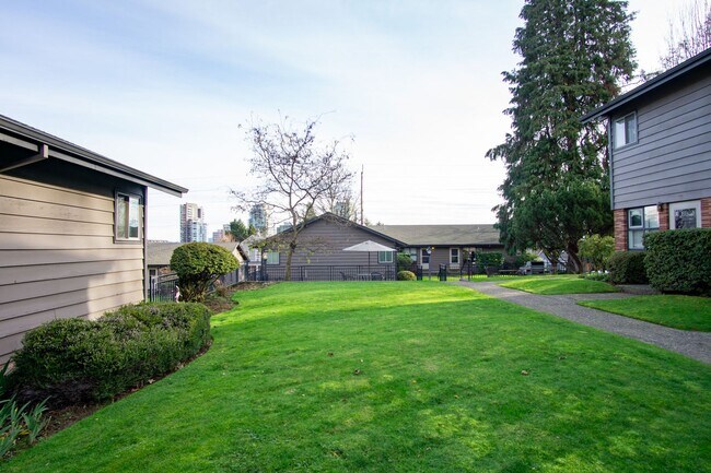 Building Photo - FOUR WEEKS FREE! Renovated Mid-Century 2Bdr w/Hardwoods, Dishwasher + Pets OK
