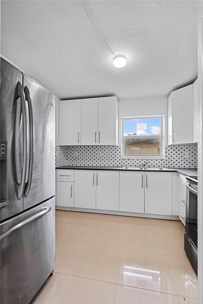 Building Photo - 3100 Coral Springs Dr