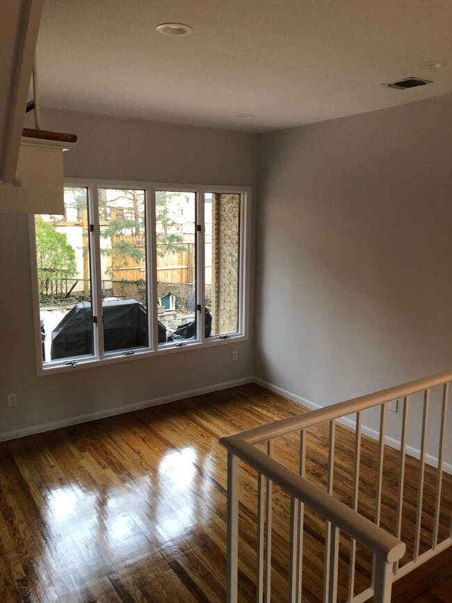 Living Room with View to Private paver backyard - 11 Veterans Way