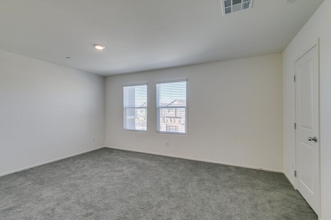 Building Photo - Gorgeous Townhome with upgrades in gated community* 3 large bedrooms, 2 car garage*Community pool...