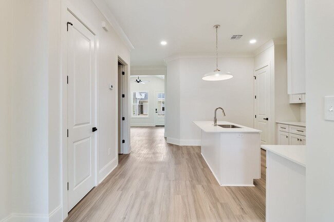 Building Photo - Brand New Upscale Single Story Townhome with private office