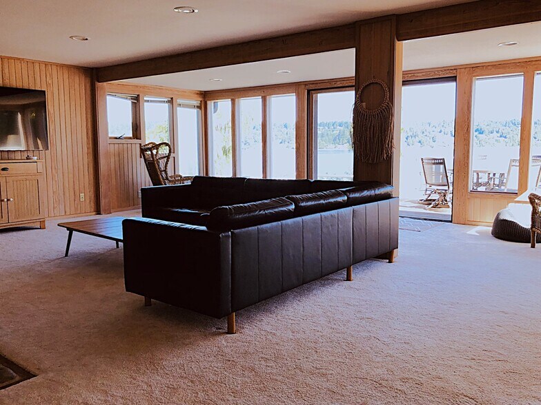 Living room has 60" SmartTV & gas fireplace - 7107 120th St NW