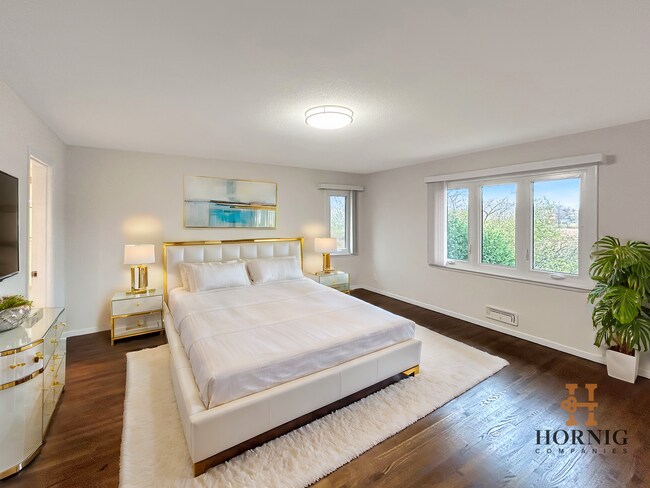 Building Photo - Stunning views. Serene atmosphere. Superb Edina. 3 Large Bedrooms (All on Upper Floor)!