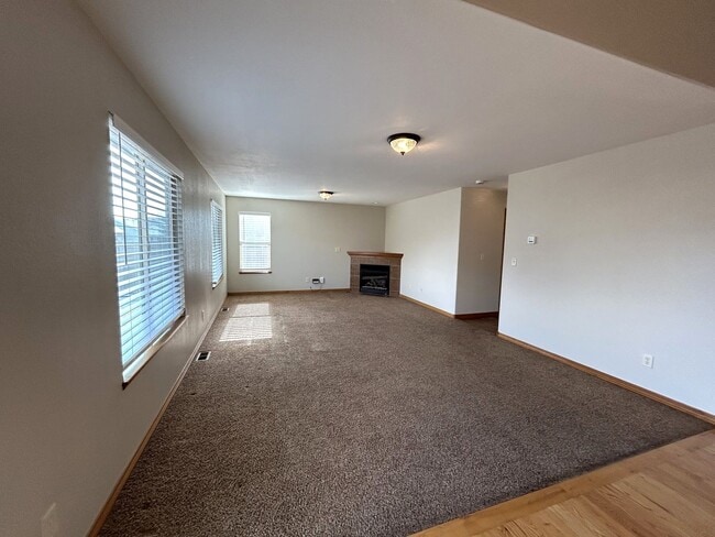 Building Photo - Spacious 5-Bedroom Home with Finished Basement and 3-Car Garage in Wellington