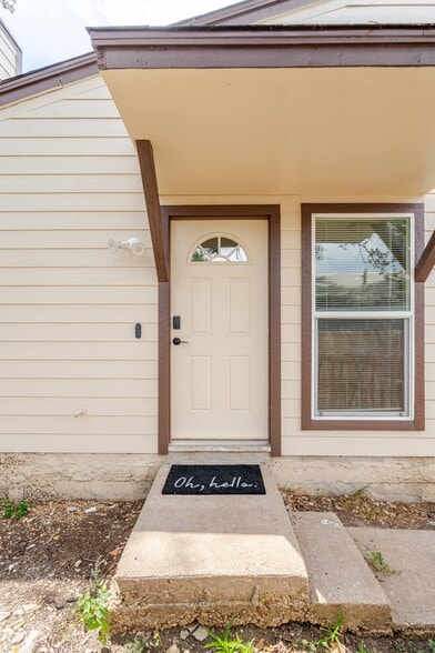Well lit front door with keypad entry - 6307 Okner Ln