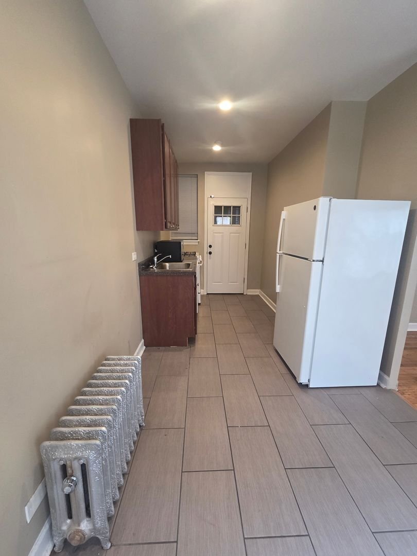 Building Photo - 5545 N Magnolia Ave