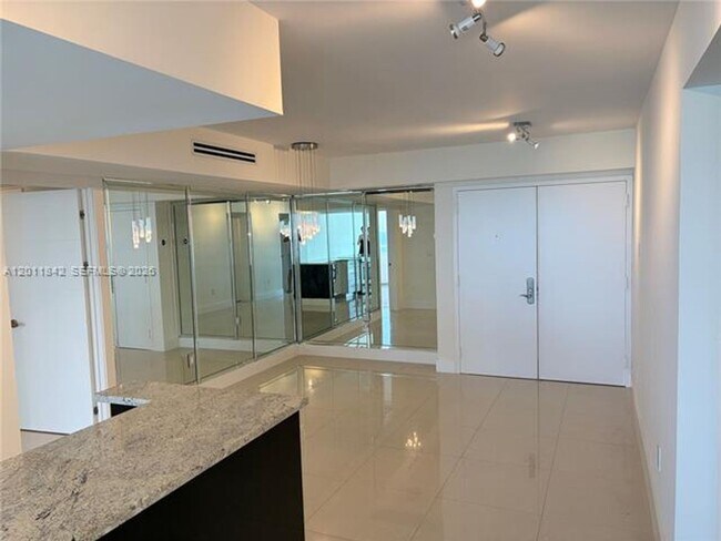 Building Photo - 6301 Collins Ave